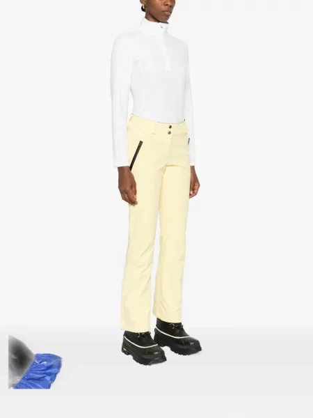 Jeździć na nartach spodnie dresowe Colmar żółte