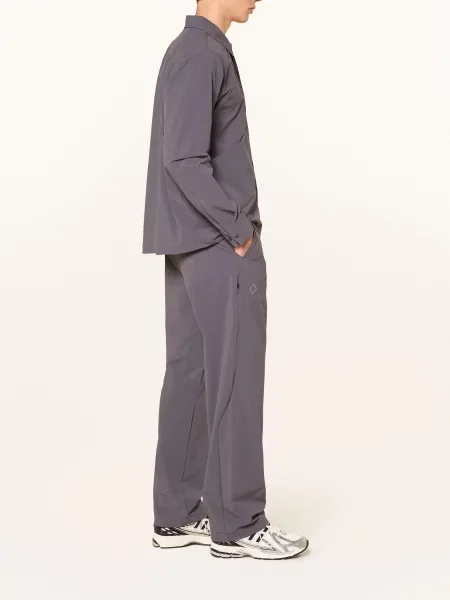 Pas Normal Studios Tréninkové Kalhoty Off-Race Tech černošedá