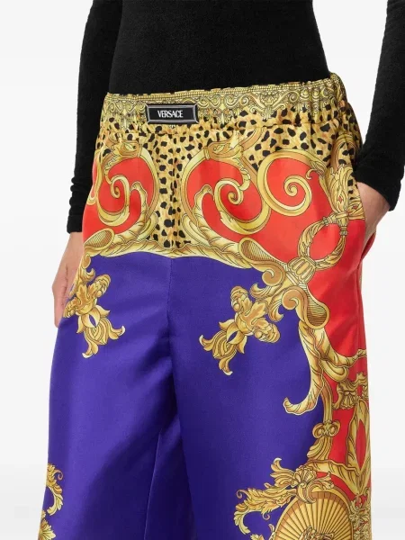 Pantaloni Versace cu imagine violet