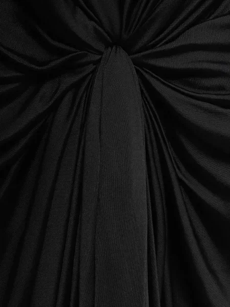 Rochie Loewe drapată de costum negru