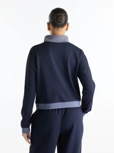 Свитер New Balance синий