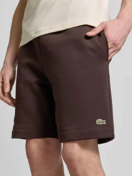 Szorty dresowe o kroju regular fit z mieszanki bawełny Lacoste