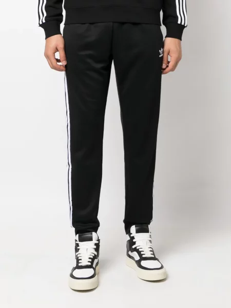 Siuvinėtos bėgimas siaurėjantys kelnės Adidas juoda