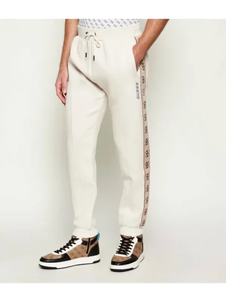 GUESS ACTIVE Jogger nadrág Mickey bézs