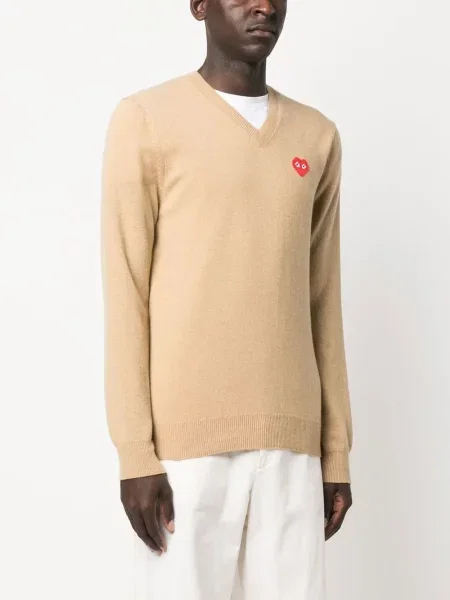 Svetr Comme Des Garçons Play s výstřihem do v se srdcovým vzorem