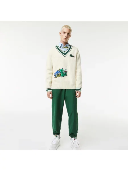 Lacoste Sweter Świąteczny W Pasy Z Dekoltem W Kształcie Litery V I Naszywką W Komiksowym Stylu biały