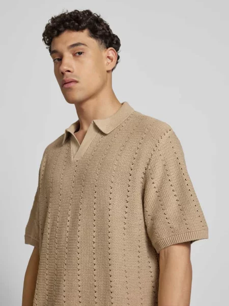 Koszulka polo o kroju relaxed fit z ażurowym wzorem model ‘PAROS’ Jack & Jones białe