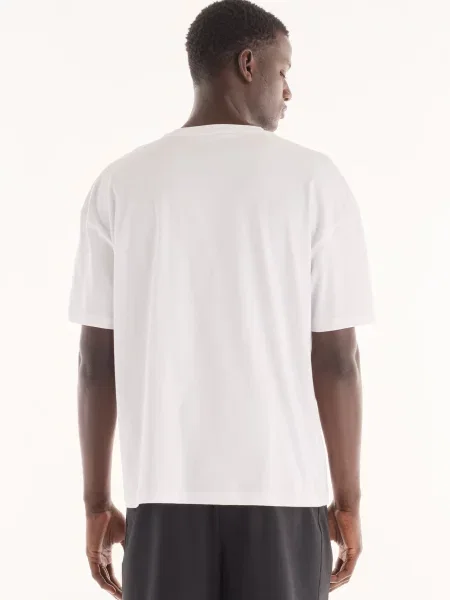 Футболка New Balance біла
