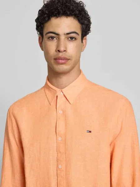 Koszula casualowa o kroju regular fit z mieszanki lnu i bawełny Tommy Jeans pomarańczowa