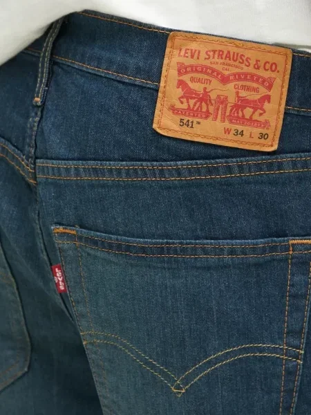 Proste jeansy Levi's 501 w paski ze stretchu dzwony niebieskie