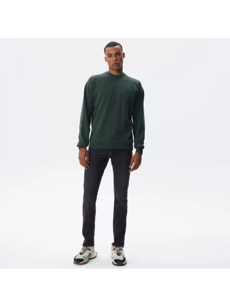 Джинсы Lacoste
