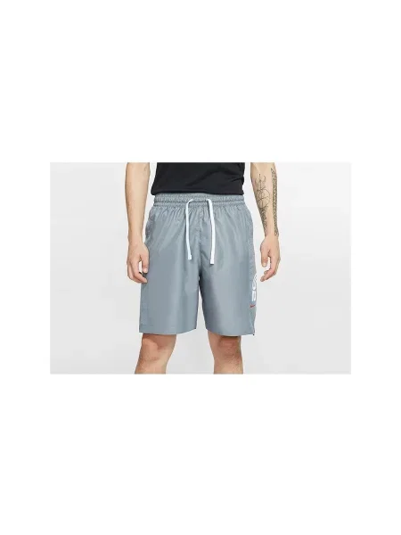 Nohavice Nike sivá