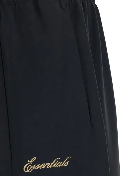 Běžecké kalhoty Fear Of God s autogramem se stahovací šňůrkou černé