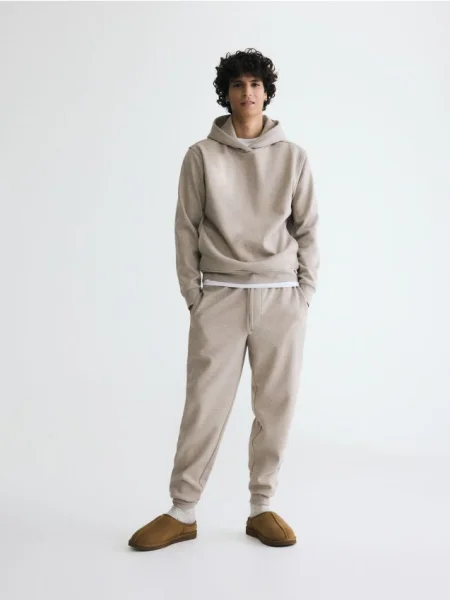 Reserved Spodnie dresowe regular fit beżowy