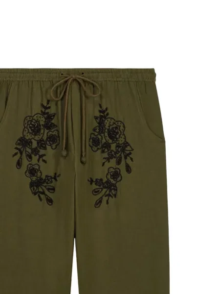 Pantaloni Baziszt cu model floral verde