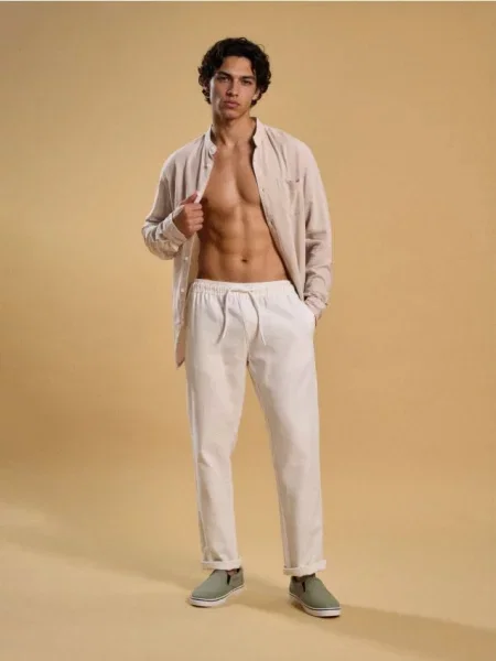 Sinsay Chino jogger kalhoty krémová