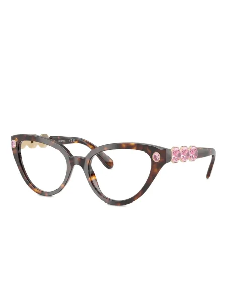 Katės akių akiniai nuo saulės Swarovski Eyewear su kristalais ruda