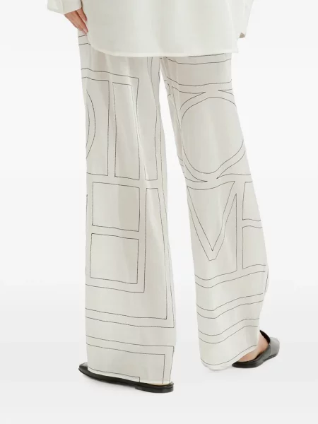 Pantaloni Toteme cu broderie alb