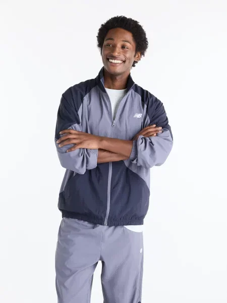 Вітровка New Balance Sport Legacy синій