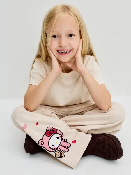 Sinsay Tepláky wide leg s potiskem Hello Kitty béžová