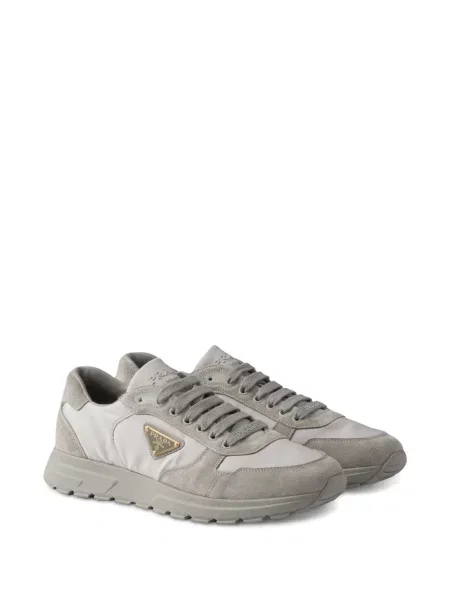 Sneakerși Prada din piele de căprioară gri