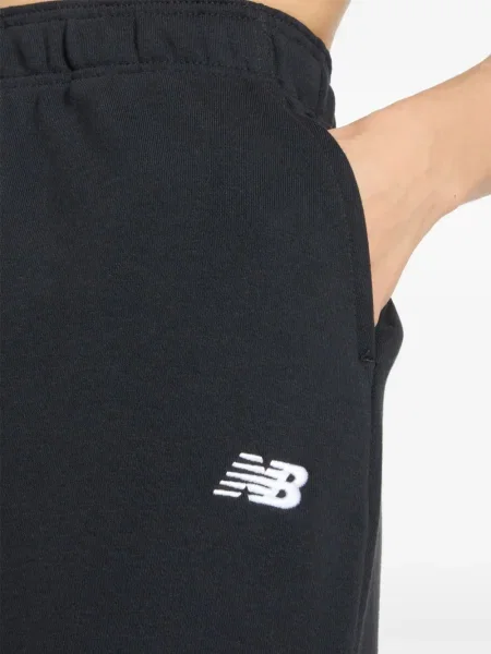 Панталони jogger New Balance с връзки с дантела черно