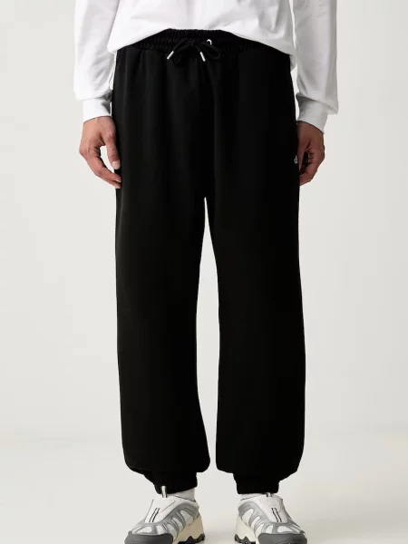 The North Face pantaloni de trening pentru bărbați cu Essential negru