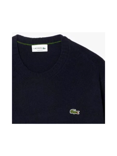 Bluza Lacoste wełniana z długim rękawem niebieska
