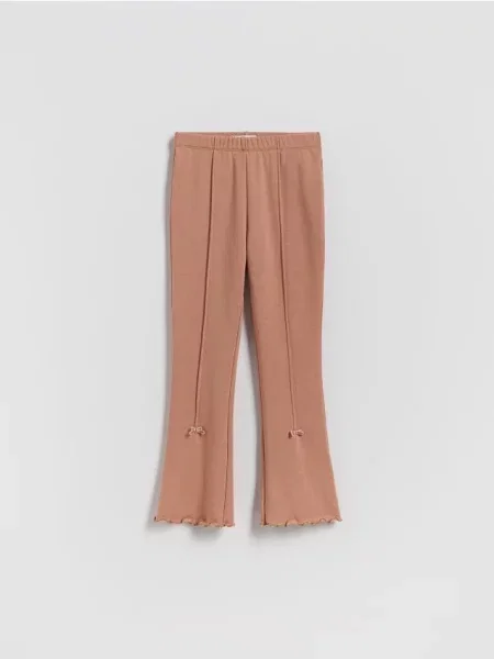 Reserved Ocieplane legginsy flare z kokardkami brązowy