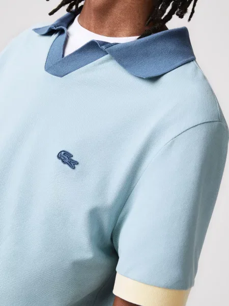 Поло Lacoste голубое
