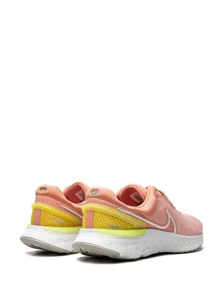 Běžecké fleecové tenisky Nike NikeCourt s potiskem hnědé