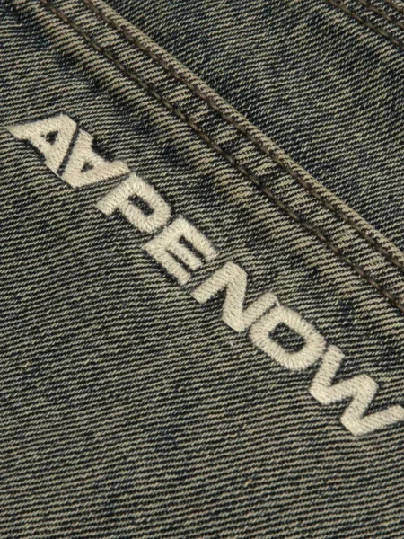 Cargo hlače Aape By *a Bathing Ape® s autogramom siva