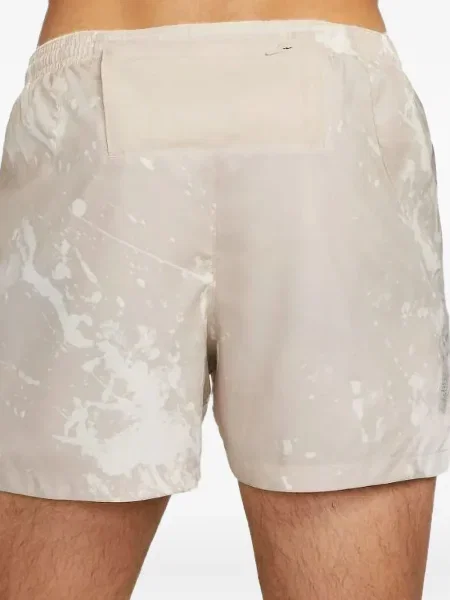 Krátké fleecové kraťasy Nike s potiskem žluté