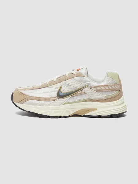 Кожаные кроссовки Nike бежевые