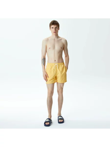 Шорты Lacoste желтые