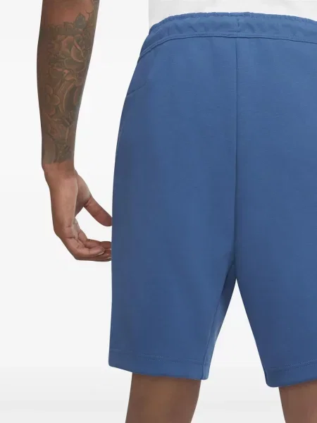 Fleecové běžecké kraťasy Nike s vázáním červené