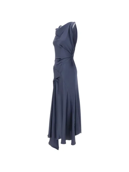 Rochie Victoria Beckham asimetrică drapată de costum albastru