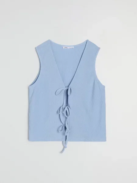 Жилет з декоративним зав’язуванням блакитний
