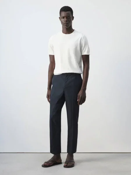 Spodnie slim fit cropped z mieszanki bawełny Mężczyzna 40 MANGO MAN granatowy