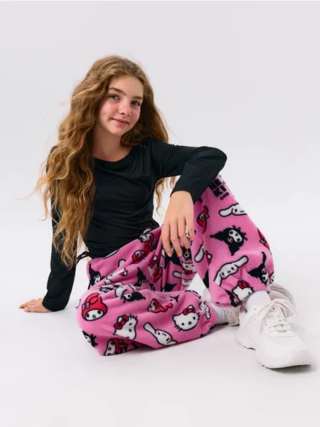 Sinsay Oversize flísové jogger kalhoty Hello Kitty and Friends růžová