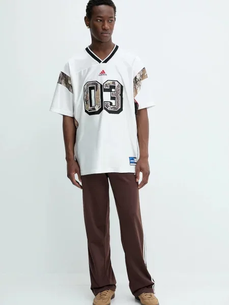 Спортивні штани adidas Originals Firebird Tp з аплікацією коричневий