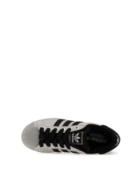 Sneakerși Adidas Copa cu dungi din piele negru