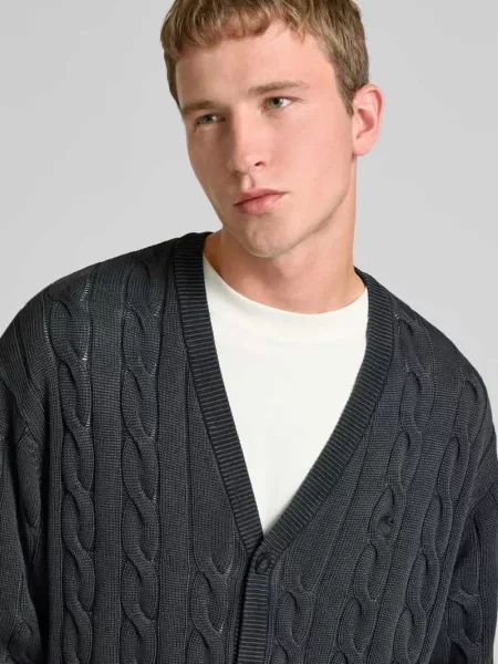 Kurtka z dzianiny ze ściegiem warkoczowym i dekoltem w serek Carhartt Wip czarna