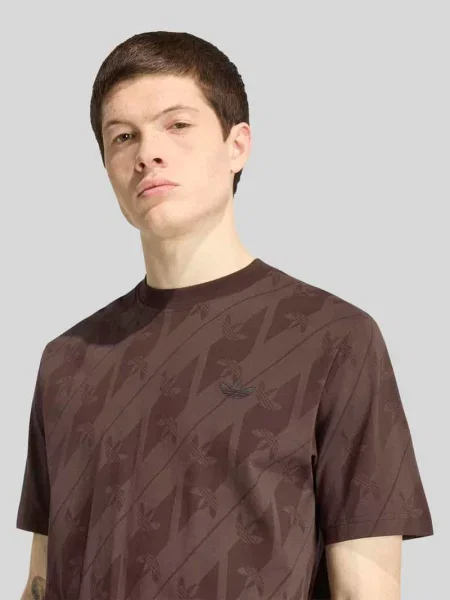 T-shirt o kroju regular fit z czystej bawełny z wzorem z logo na całej powierzchni Adidas Originals