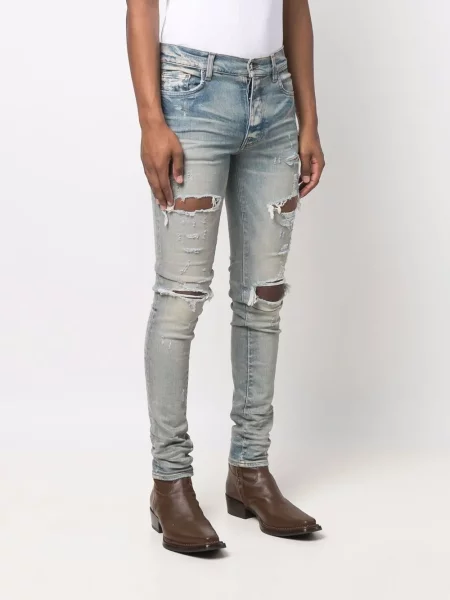 Skinny jeansy skinny Amiri z przetarciami niebieskie