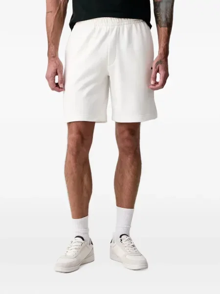 Pantaloni scurți Lacoste din fleece alb