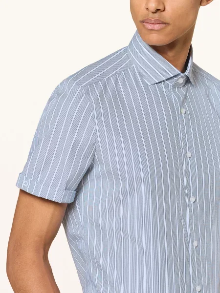 Koszula biznesowa o kroju slim fit z blokowymi pasami i kołnierzykiem typu kent Olymp Level Five biała
