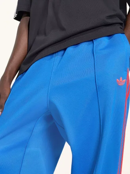 Sportovní kalhoty Adidas Originals červený
