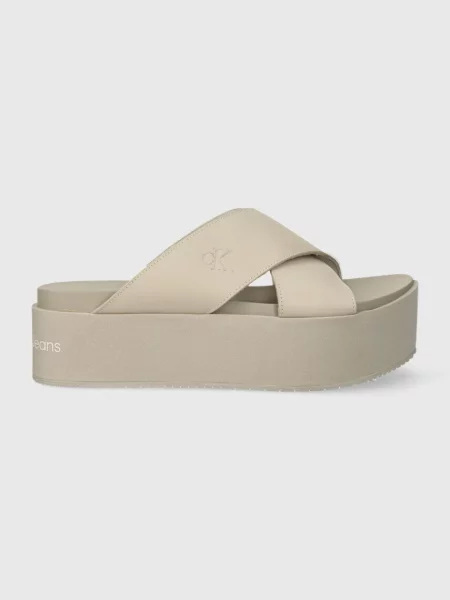 Кожени чехли Calvin Klein Jeans FLATFORM CROSS MG UC бежово с платформа