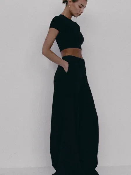 Muuv. hlače s širokimi hlačnicami JOIA črna